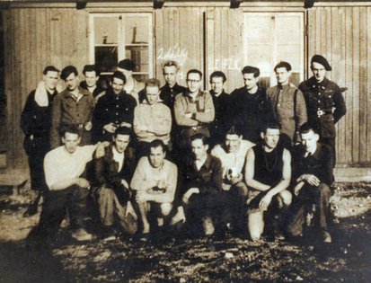 Dutch prisoners of war in front of a barracks hut, HASAG Leipzig, April 1944 © Augustijn family collection