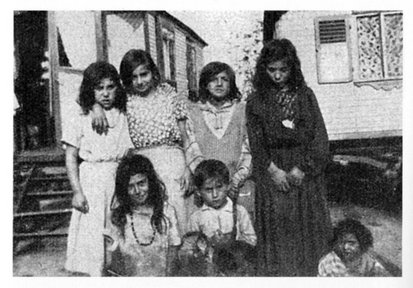 Otto Rosenberg and his sister Therese (front row) with other children in the Marzahn camp, after 1936, Berlin. Therese was murdered in Auschwitz-Birkenau on 19 May 1943 © Landesverband Deutscher Sinti und Roma e.V.